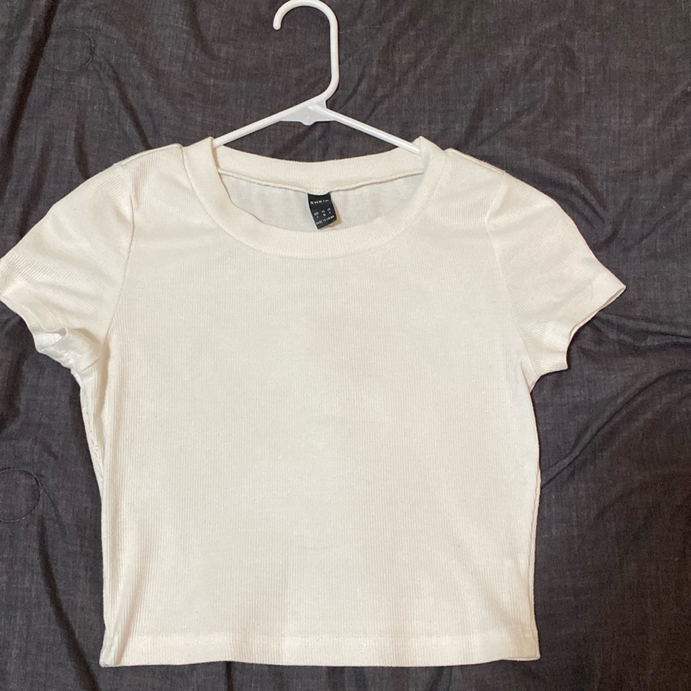white tight fit top